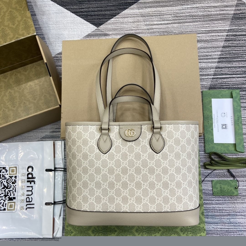 G*u*i shopping bags